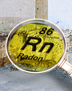 Magnifying glass over Radon periodic symbol, 86 Rn Radon