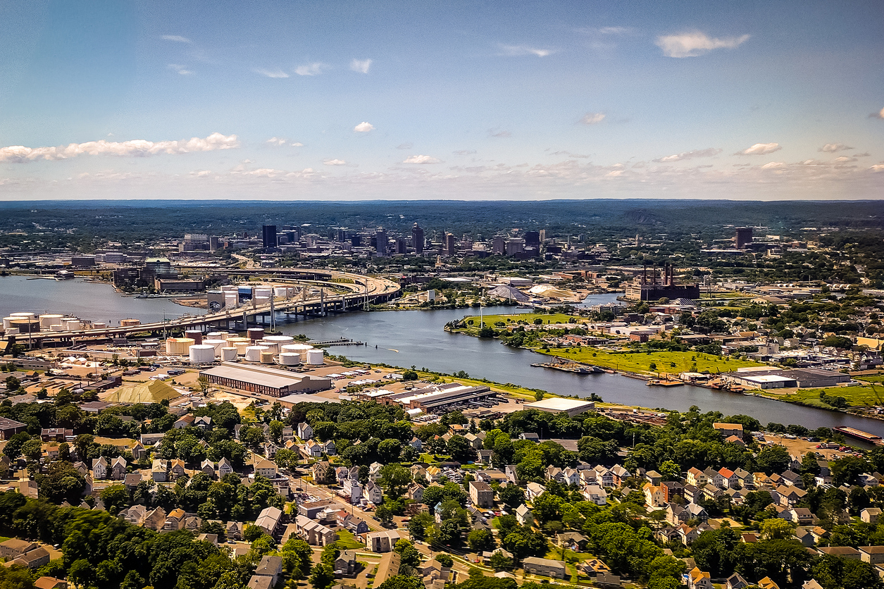 Aerial view of Hartford, Connecticut highlighting commercial real estate and infrastructure related to new environmental cleanup regulations.