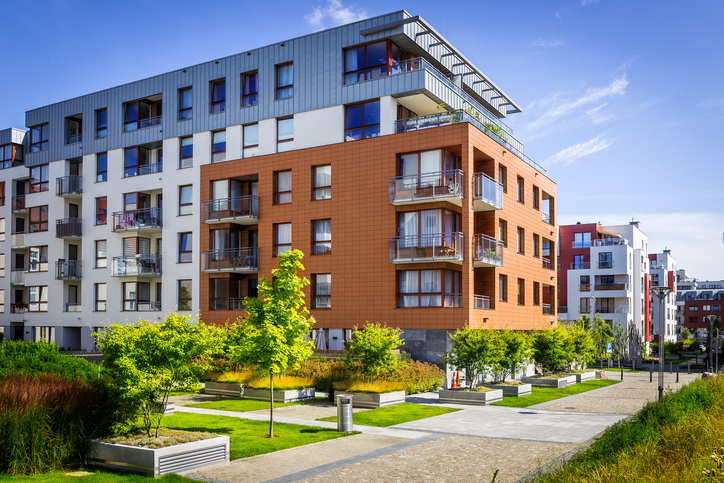 Modern multifamily property illustrating mold and moisture risk management