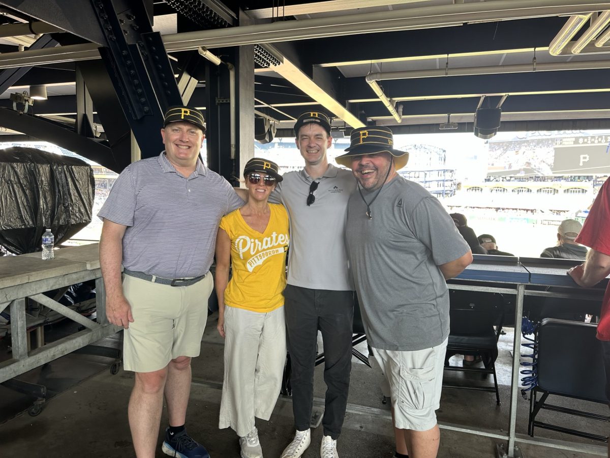 Hillmann colleagues at a Pirates baseball game.