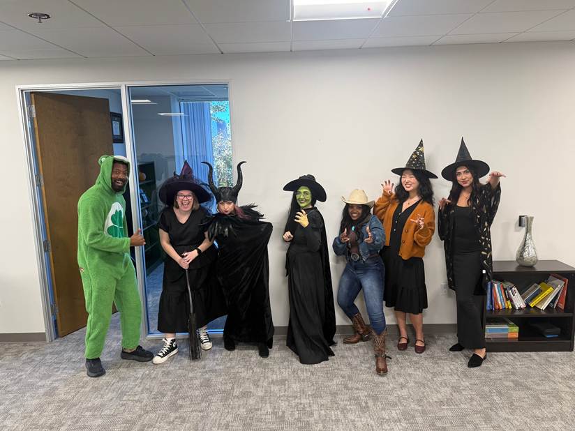 Hillmann colleagues in costumes for Halloween.