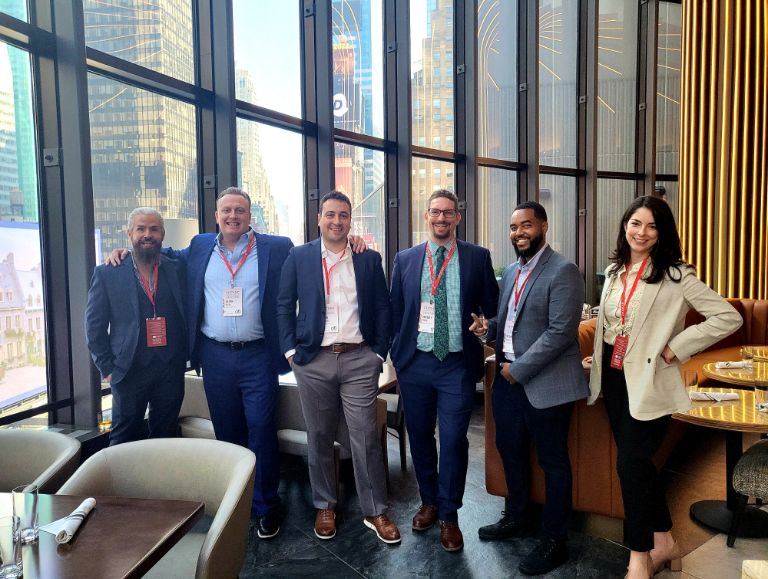 Hillmann-Team-Attending-a-Conference
